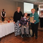 ILCNSCA Deputy Director Shawn McDuff along with his wife Maria receiving the 2015 Leavitt Award for Lifetime Achievement presented by ILCNSCA Executive Director Mary Margaret Moore